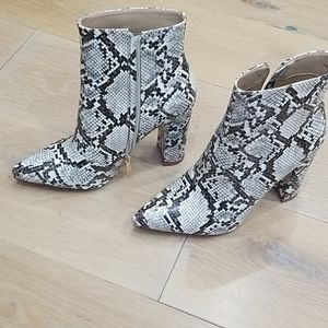 Snakeskin pointed toe booties